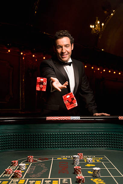 Live baccarat table with card shoe and dealer